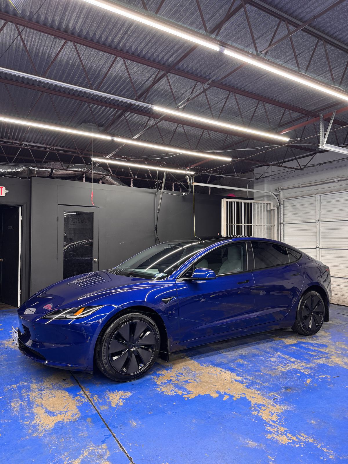 Blue Tesla ceramic coating at ShineLab studio, San Antonio